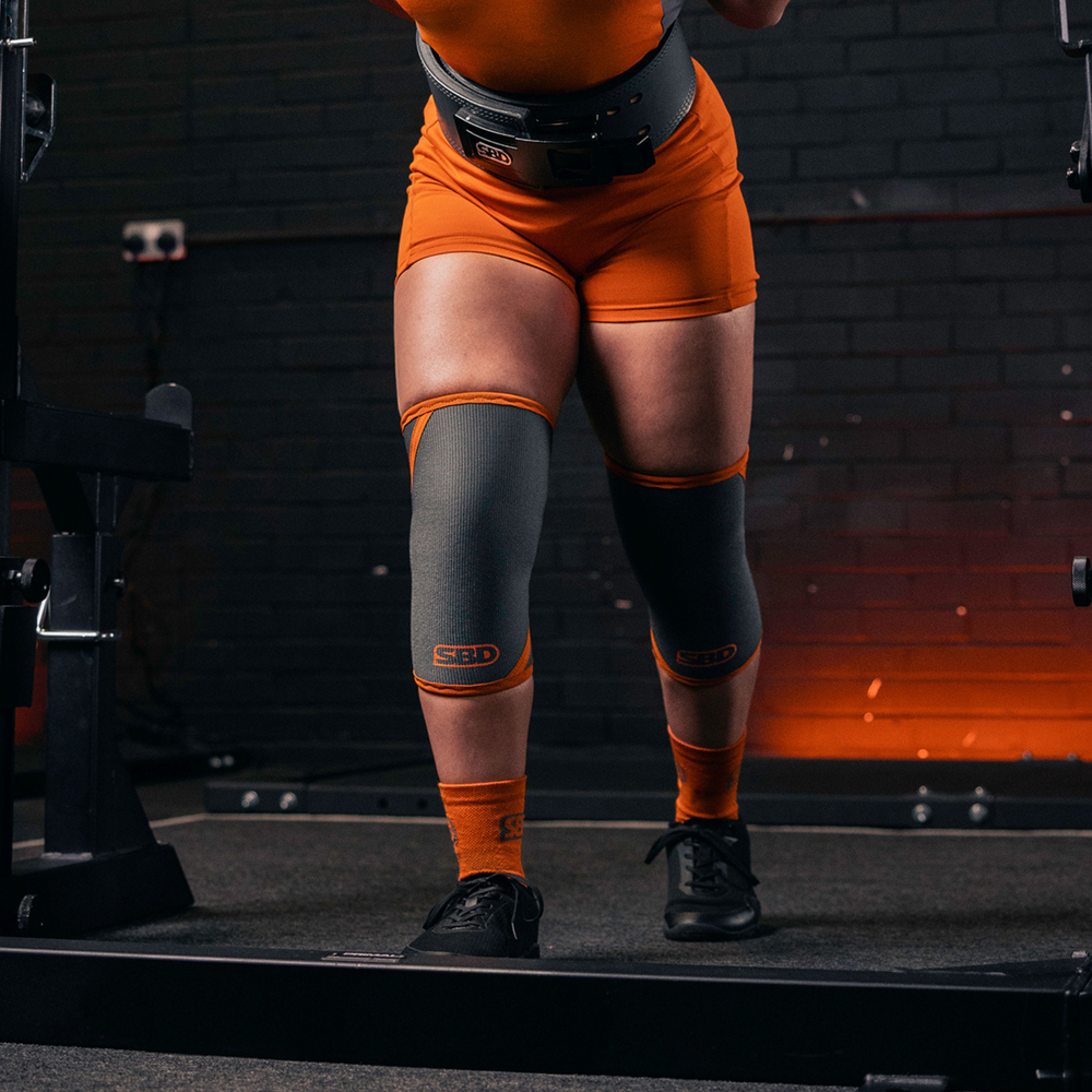 Grey/orange knee sleeves