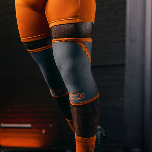 grey/orange knee sleeve