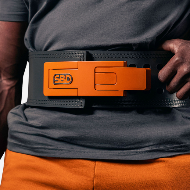 Orange buckle on Grey belt